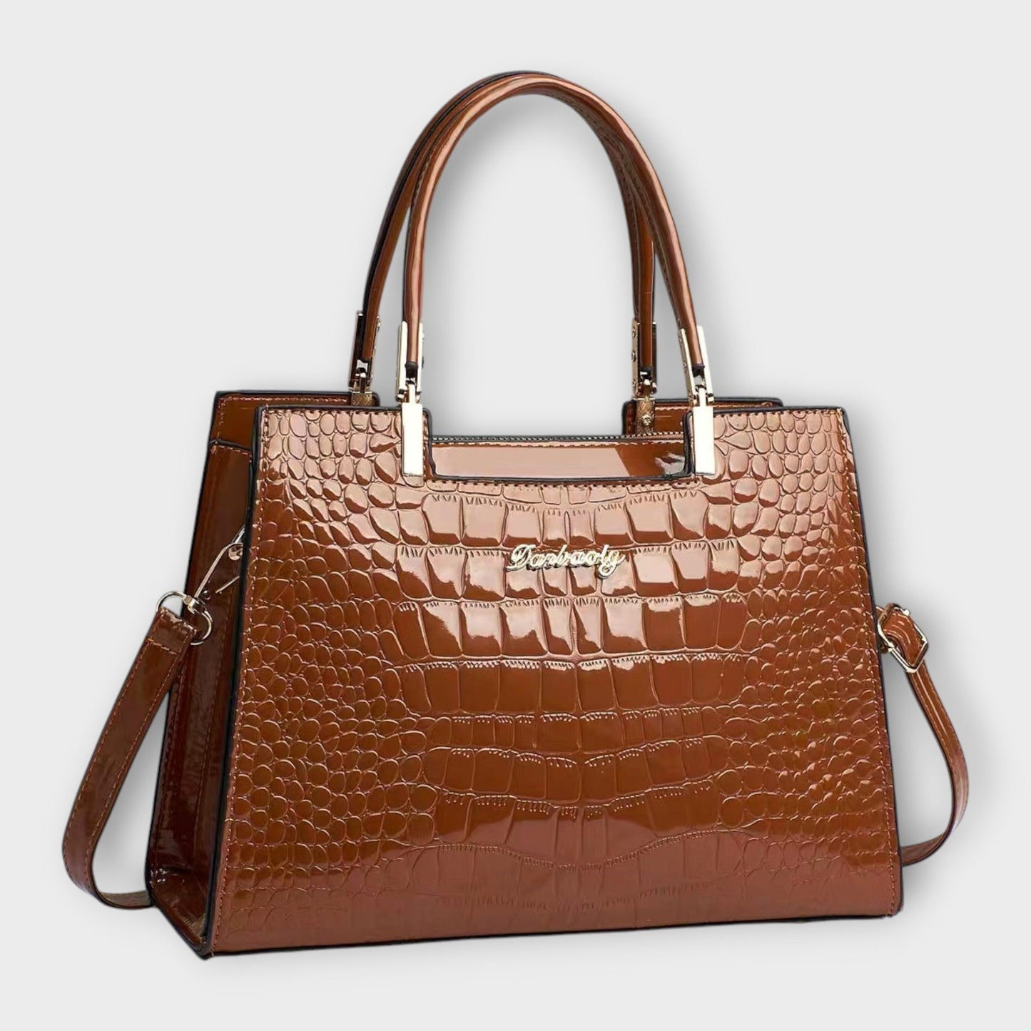 Léora. - Glänzende Krokodilledermuster-Handtasche