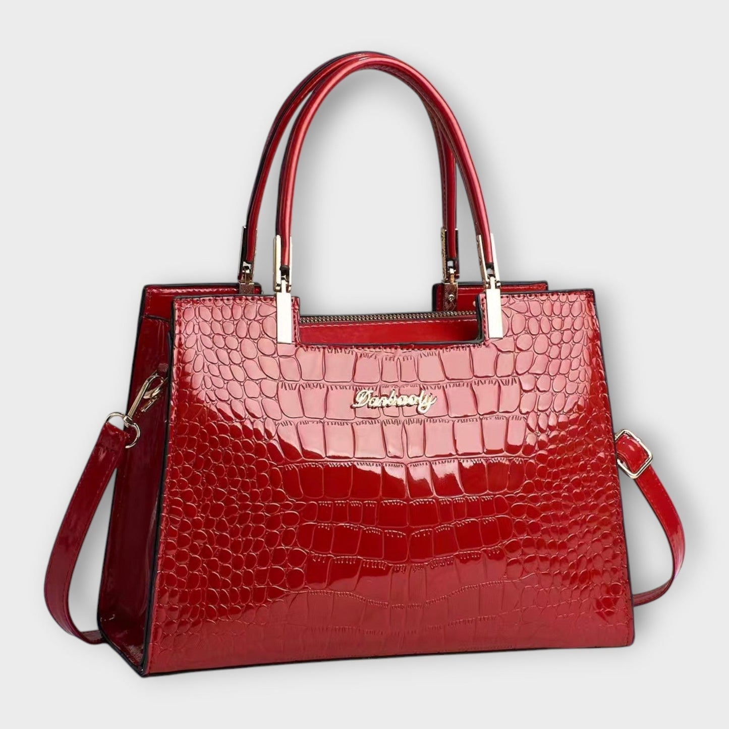 Léora. - Glänzende Krokodilledermuster-Handtasche