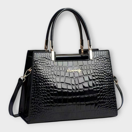 Léora. -  Glänzende Krokodilledermuster-Handtasche