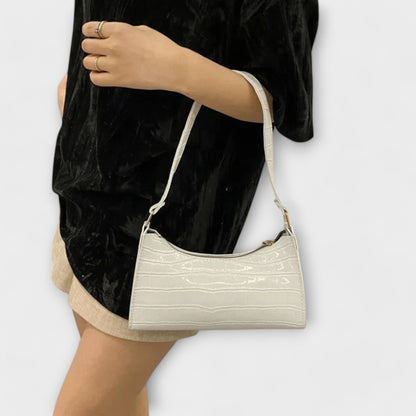 Léora. Glänzende Ledertasche