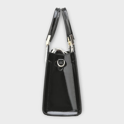 Léora. -  Glänzende Krokodilledermuster-Handtasche